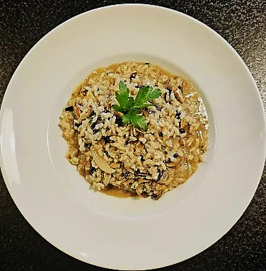 Risotto con pollo o manzo – Rice, mushrooms, with chicken or halal beef
